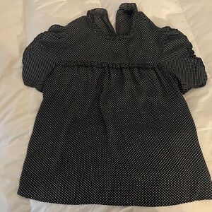 Black polka dot ruffle blouse. Who What Wear.
